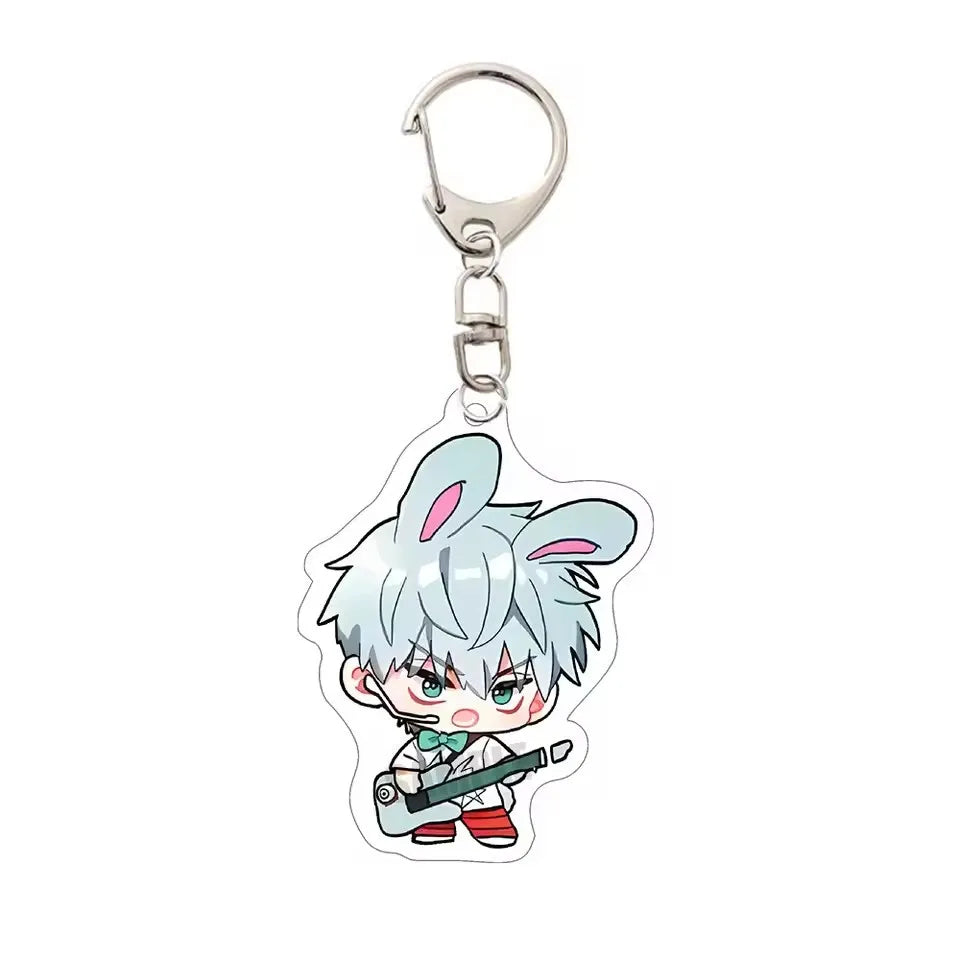 Acrylic keychain featuring an anime character with light blue hair and pink accents.
