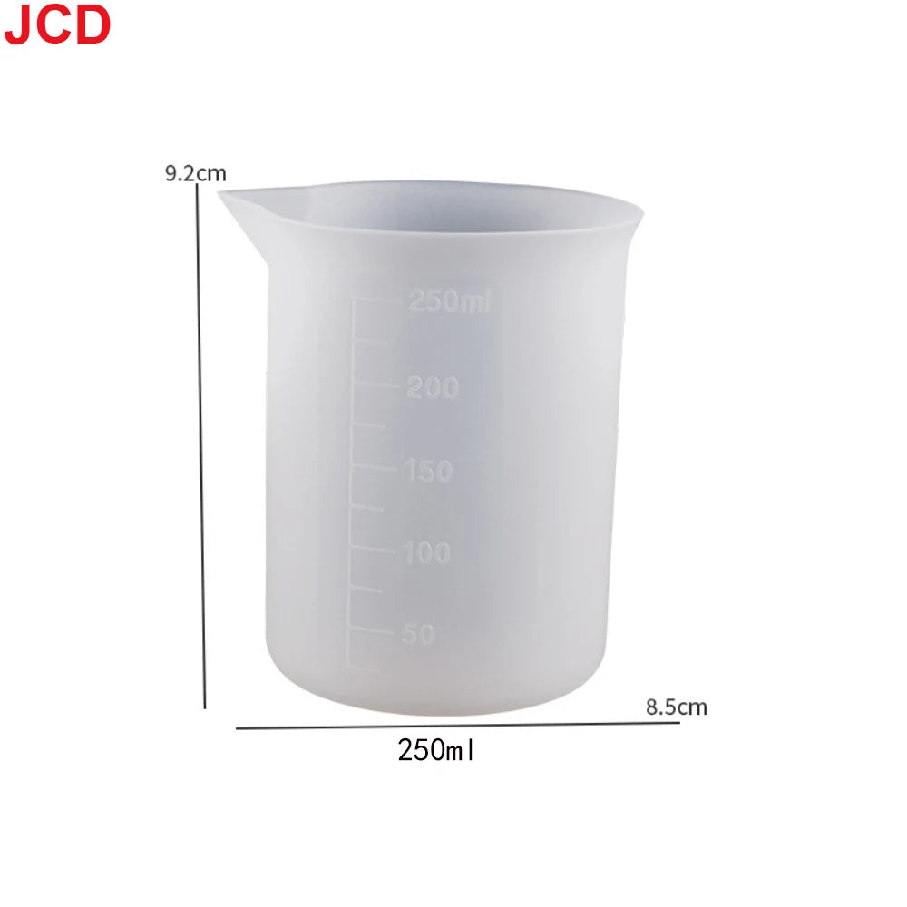 A white flexible silicone measuring cup with volume markings, showing 250ml capacity.