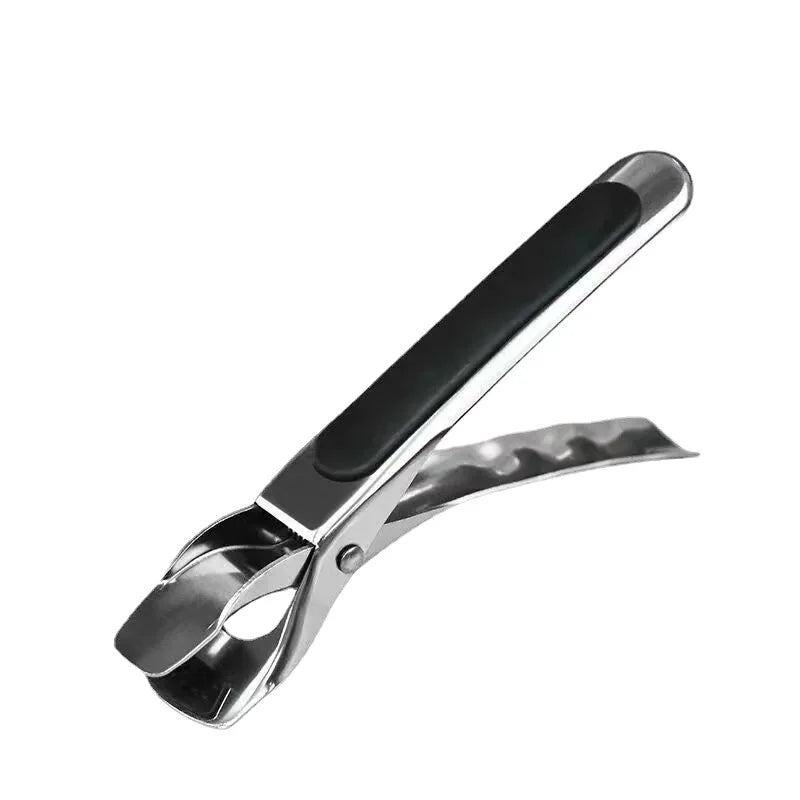 A silver metal tong with a black non-slip silicone grip used for gripping kitchen items.