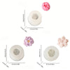 A set of silicone crystal epoxy glue molds for DIY succulent pots, showing various flower and rosette shapes in pink and whit