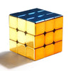 A glossy gold magnetic 3x3 speed cube with blue accents, shown from above.