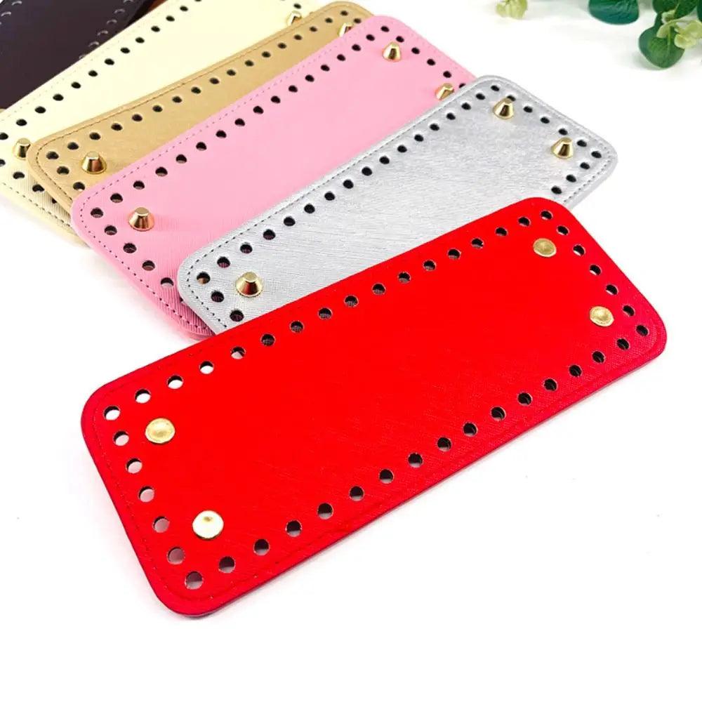 A set of four pink and red PU leather crochet bags with pre-punched holes arranged diagonally.