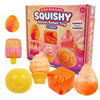 Eine Box mit quetschbaren Stressballspielen in verschiedenen bunten Formen wie Eiern, Süßigkeiten und Früchten in Rosa