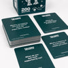 A stack of dark green talking hearts cards with questions for couples conversation displayed on a white background.