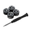 A set of three black aluminum beadlock wheels and a corresponding drill bit for an RC car.