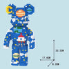 A blue cartoon bear building kit made of interlocking plastic blocks with articulated joints.