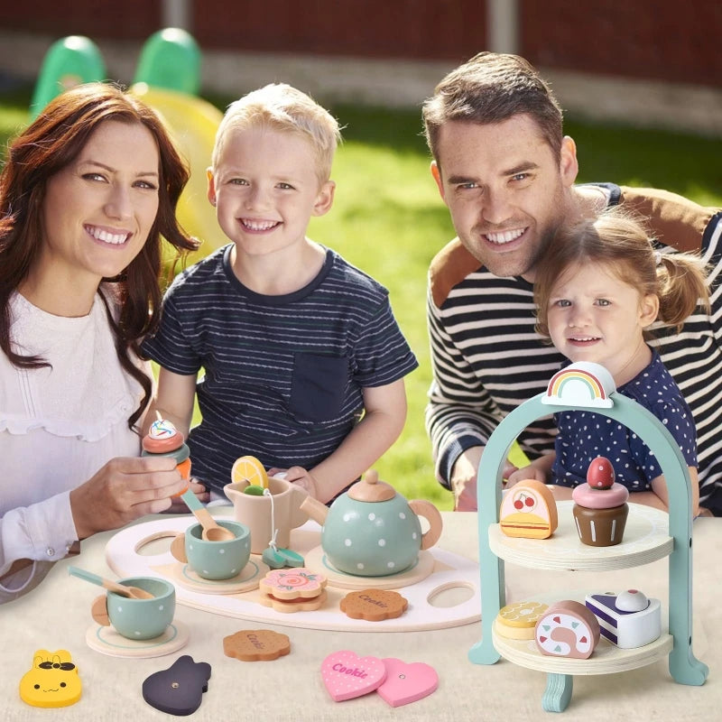 A wooden pretend play tea party set for kids featuring various cups, food items, and a stand.