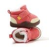 A pair of coral pink plush-lined winter boots for toddlers with tan accents.