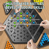 Hands assemble a triangle chess strategy board game for multiplayer battles to develop social skills