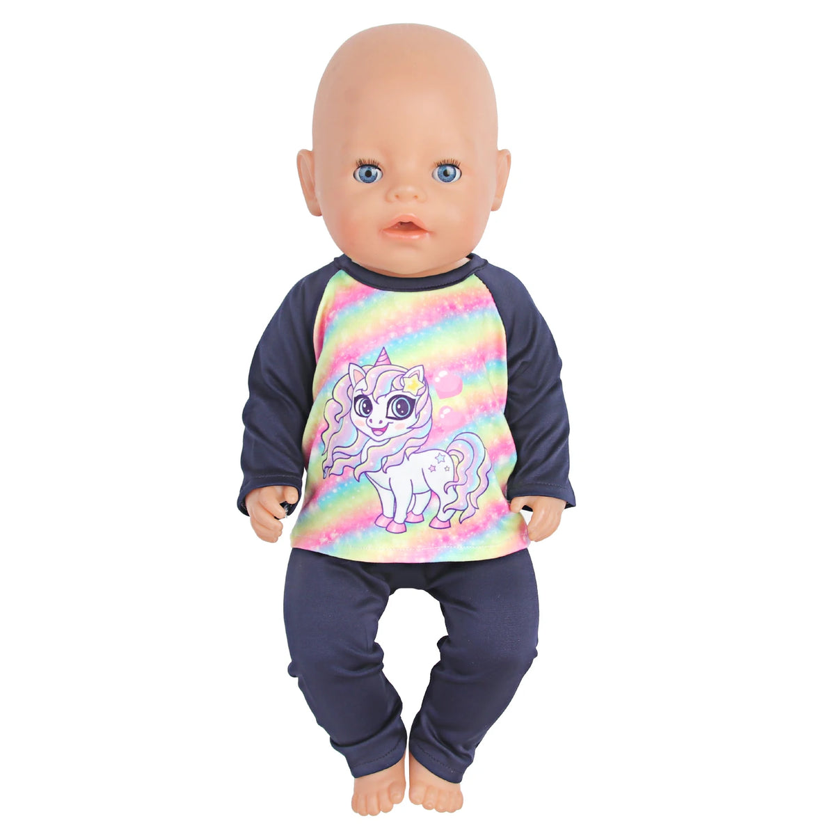 A baby doll wearing a colorful unicorn pajama set.