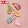 A collection of LABUBU The Monsters hair salon series doll bags and pendant keychains on a pink background.