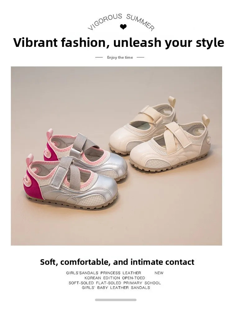 A pair of pink and silver leather slip-on sandals for girls shown on a light background.
