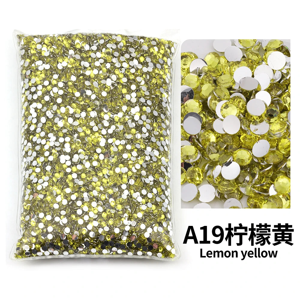 Bag of lemon yellow flat-back resin rhinestones for DIY craft and nail art