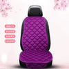 A purple quilted car seat cushion set with black trim shown from the back.