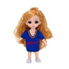 An orange-haired Articulated BJD princess doll wearing a blue shirt.