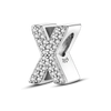 A sterling silver alphabet charm shaped like an X, encrusted with cubic zirconia stones.