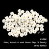 A pile of white round 1x1 building blocks with a flower edge, sold in a 300-piece set.