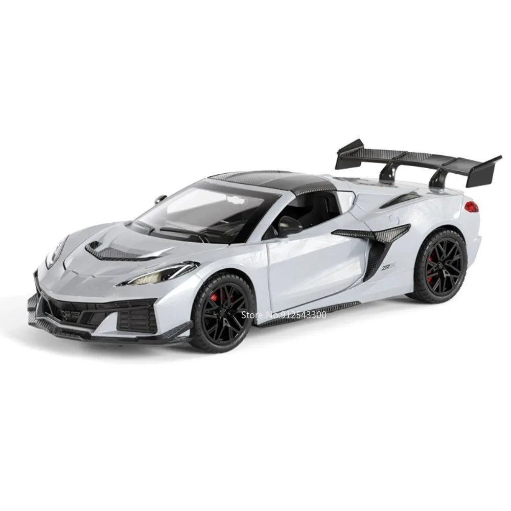 A silver 1:32 scale diecast supercar model with pull-back action and opening doors.
