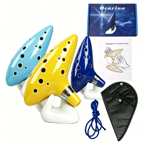 A set of three ceramic alto ocarina instruments in blue, yellow, and dark blue with a music sheet and a picture of the instru