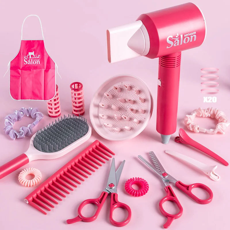 A pink hair dryer and various red plastic hair tools including combs, brushes, and scissors for a kids' pretend play beauty s
