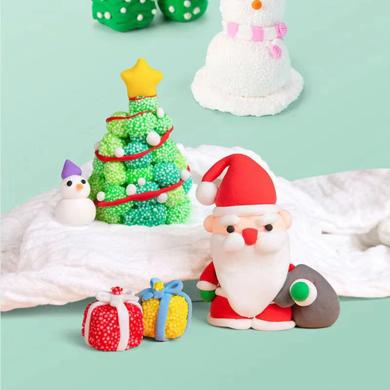 Air-dry modeling clay set featuring a Christmas tree, snowman, and Santa figure with tools for creative kids