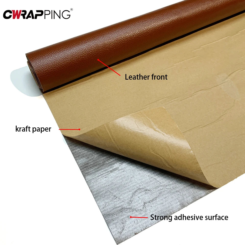 A roll of brown kraft paper is being covered with a leather front using a strong adhesive surface.