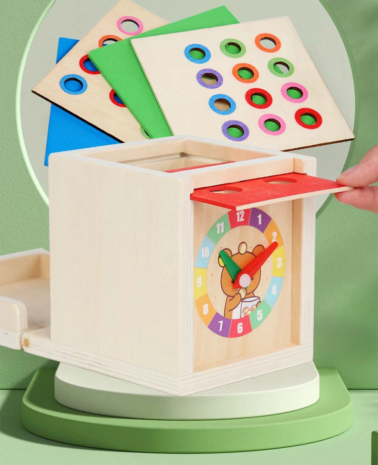 A wooden Montessori toy set featuring a box and a rotating clock face with numbers and animal figures.