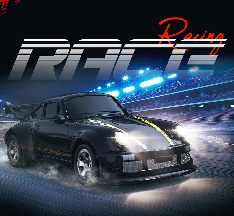 A black RC drift car is speeding on a track with bright blue lights in the background.
