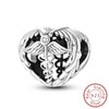 Sterling silver charm beads set featuring cross, angel, and evil eye designs for DIY jewelry making
