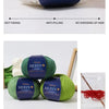 Green YEDAN MERIN wool yarn balls demonstrating non-fading, anti-pilling, and no shedding properties.