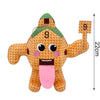 A yellow plush toy shaped like a cute game character with green accents and a number 9, holding a wooden block.