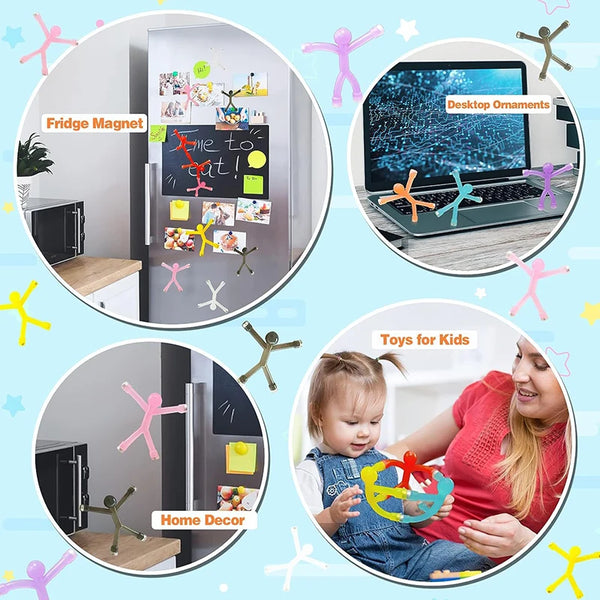 A collection of colorful mini human fridge magnets displayed alongside a laptop and toys for kids.
