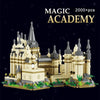A LEGO set of a medieval castle built from tan and gray bricks, featuring towers and battlements.