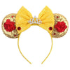 A yellow princess headband accessory set featuring gold glitter, a crown, and red roses.