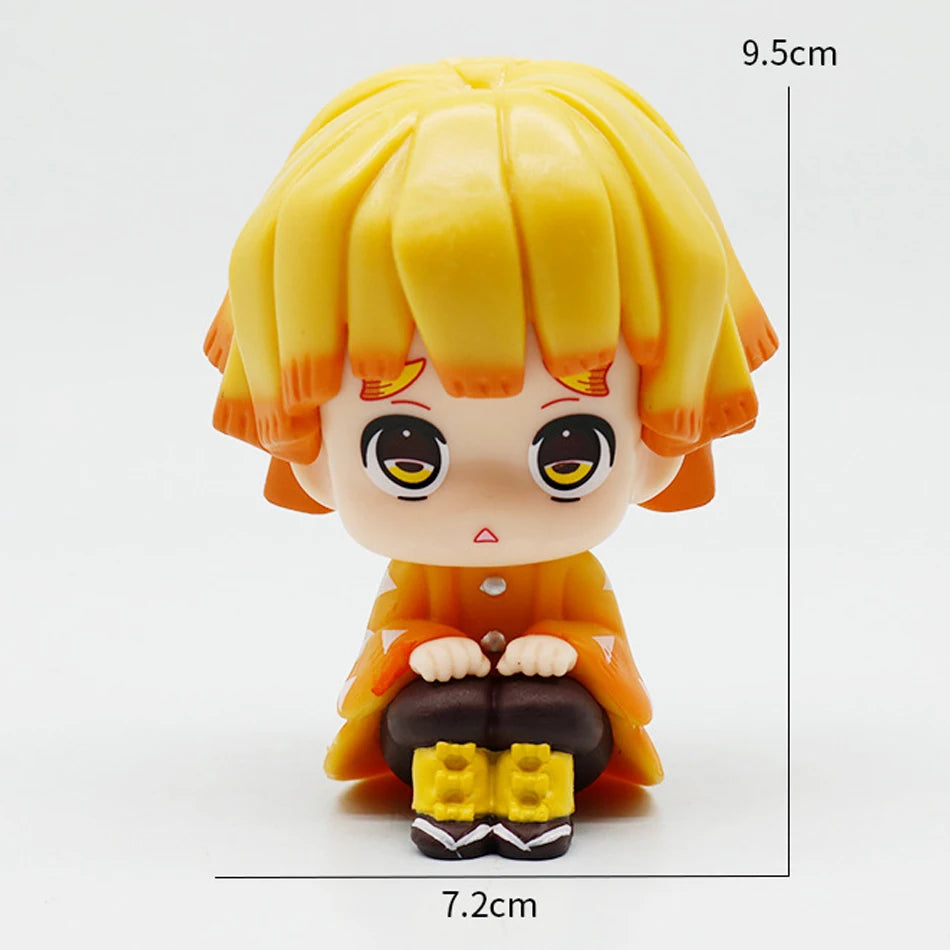 A figure set of Tanjiro and Nezuko from Demon Slayer, featuring yellow hair and orange clothing.