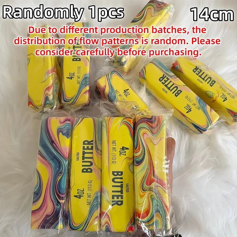 A collection of randomly distributed yellow and multicolored squishy butter stick fidget toys.