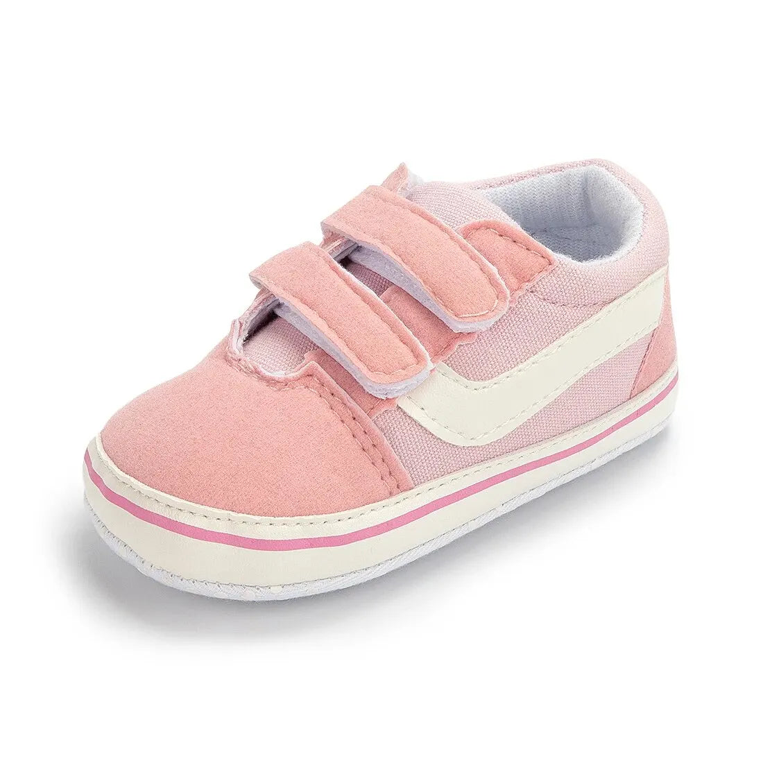 Pink and white canvas baby sneakers with pink straps and a light blue lining