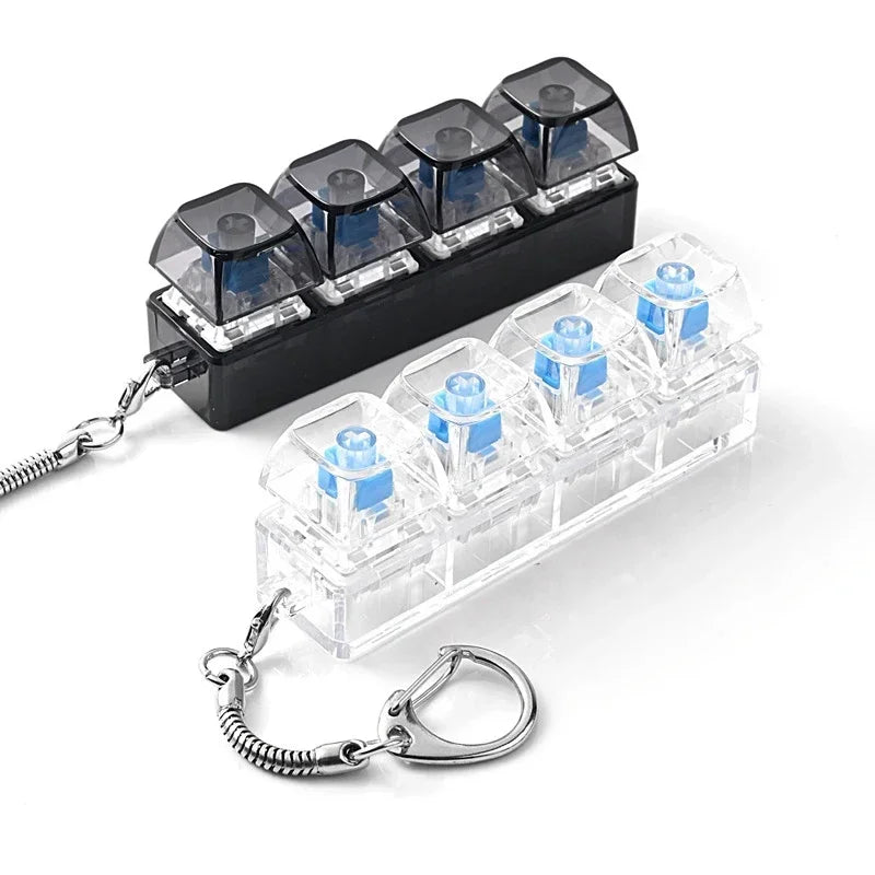 A black plastic fidget toy with multiple clear hexagonal key pieces and attached chains.
