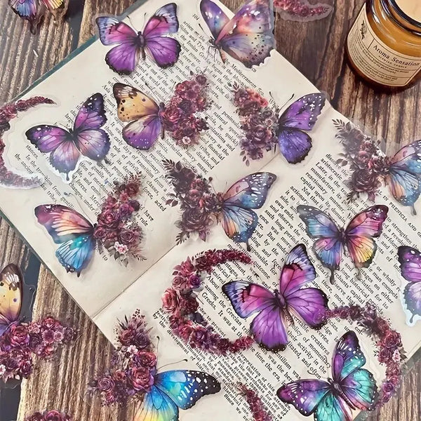 Set dekorativer Aufkleber mit Schmetterlingen und Blumen auf einer Seite mit handschriftlichem Text