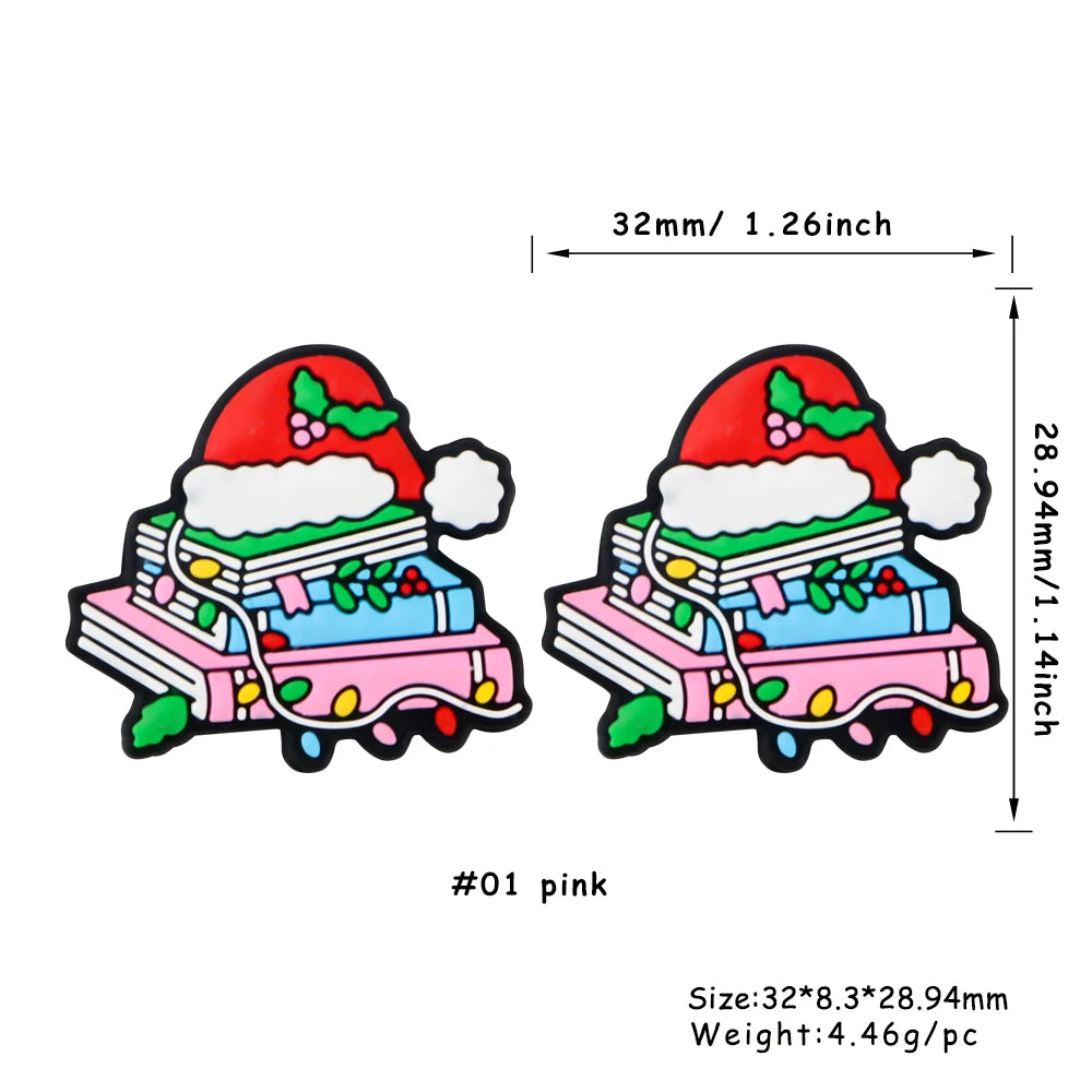 Pink festive Christmas silicone beads shaped like a gift box with a red and green Santa hat