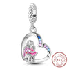 Sterling silver heart charm bead featuring a silhouette of a mother and child.