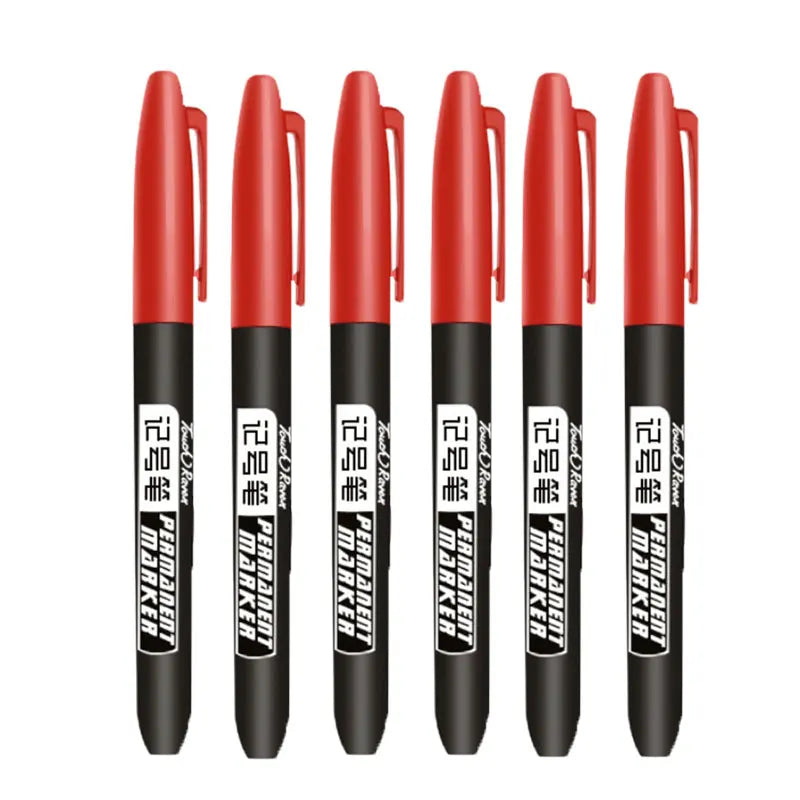 A pack of six red permanent fine-tip markers standing upright.