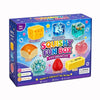 A box of Squishy Fun Box containing 8 sensory toys including cheese, snowflake, ocean, apple, bread, and strawberry cubes.