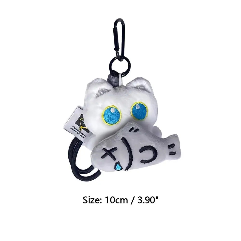 A cute plush black cat keychain with blue eyes and a dangling loop.