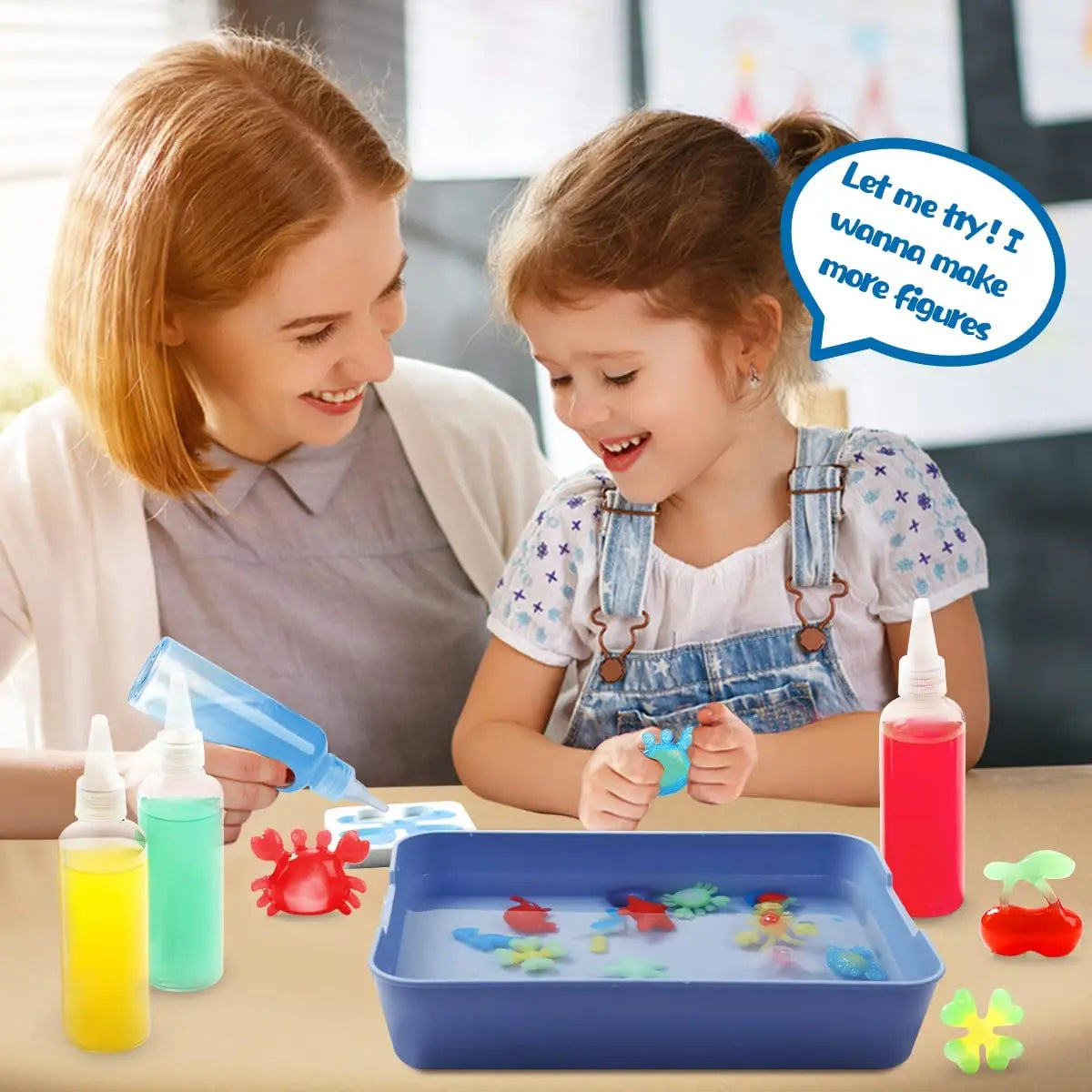 A mother and daughter are using a Magic Water Animal Beads Kit in a blue tray to create colorful figures.