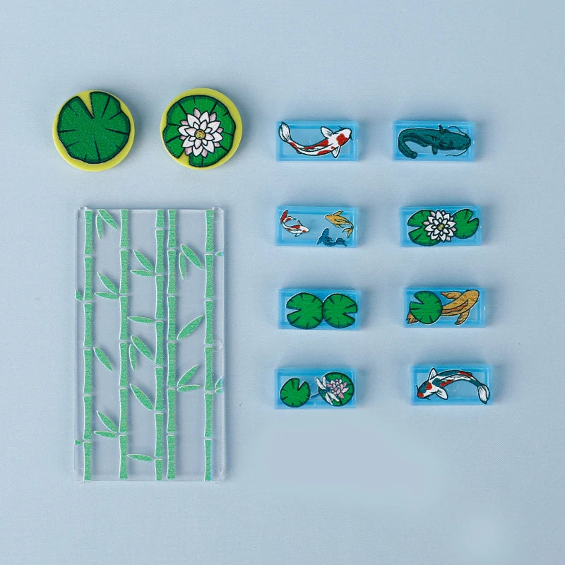 A set of marine animal building blocks including a shark, octopus, and whale in various colors.