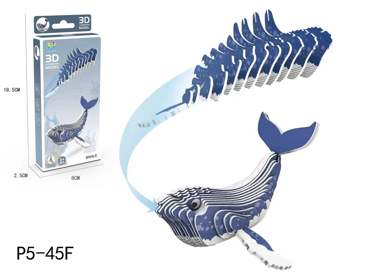 A blue whale 3D paper puzzle model showing the animal from a side view.