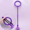 A purple glowing ankle skip ball with a black handle and flashing LED light, shown next to a hand.