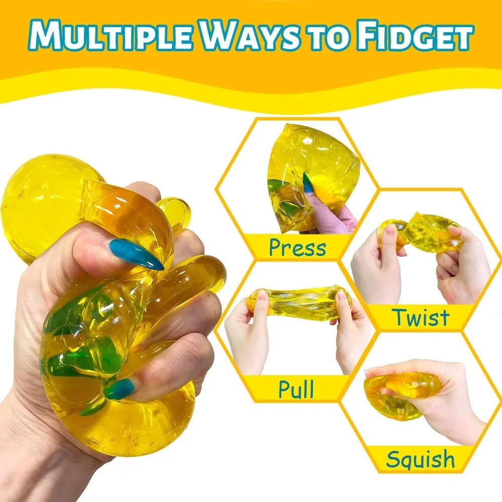 A hand is squeezing a yellow honey cheese squishy stress ball, demonstrating various fidgeting methods like press, twist, pul
