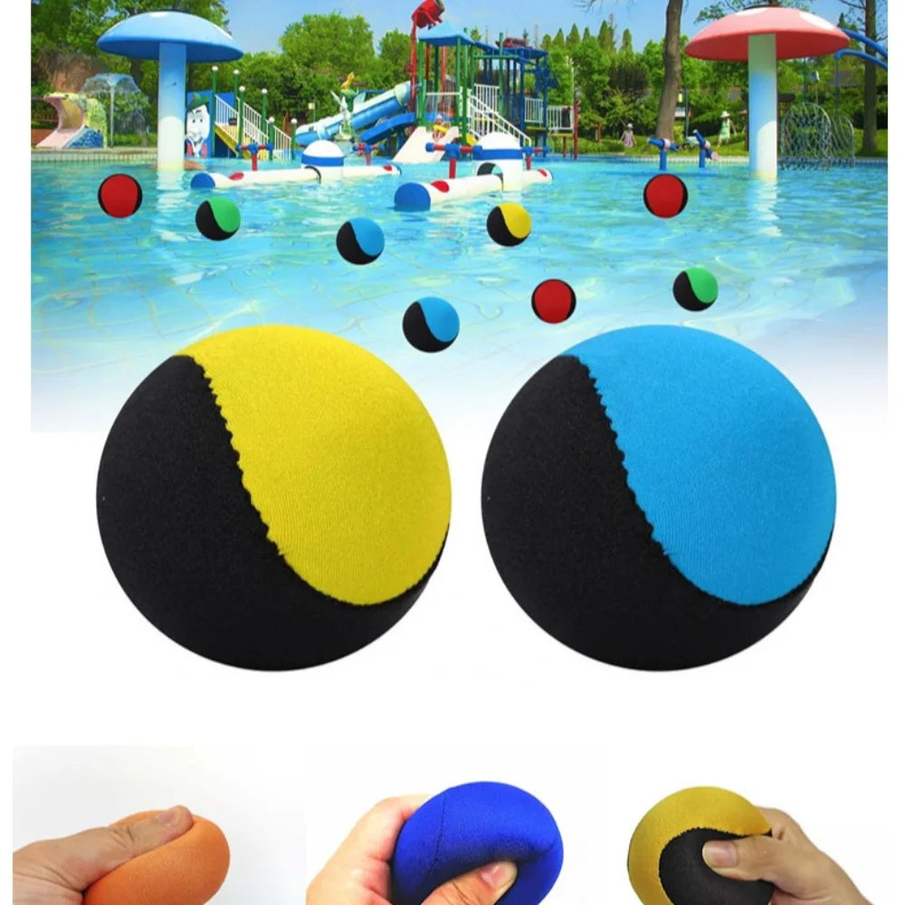 A set of black and yellow water bouncing balls for summer pool and beach games.